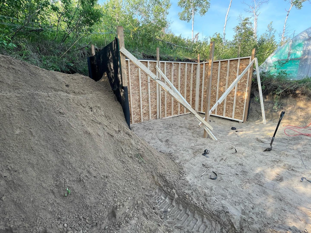 back walls for our root cellar are framed, the front wall will be insulted and have a door, and become the back wall