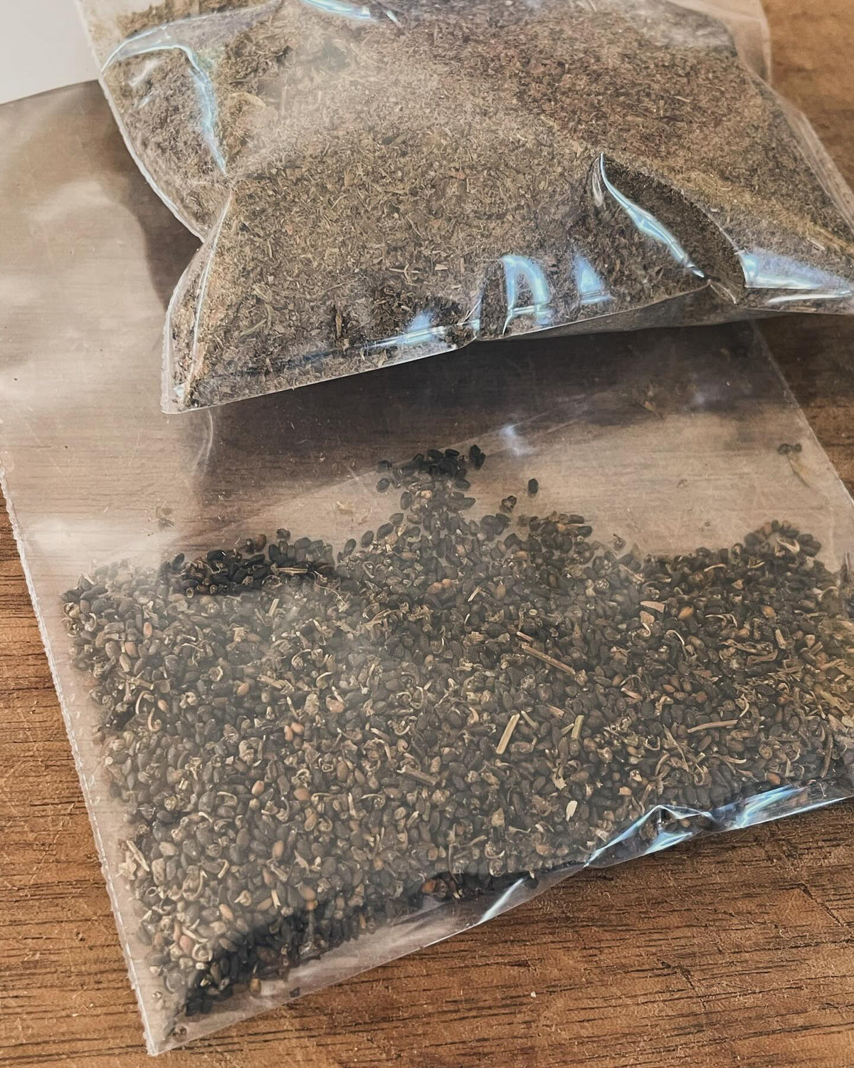 cleaning basil seed, I like to crush the flowers and then spread on a tilted cutting board, image 4 of 4