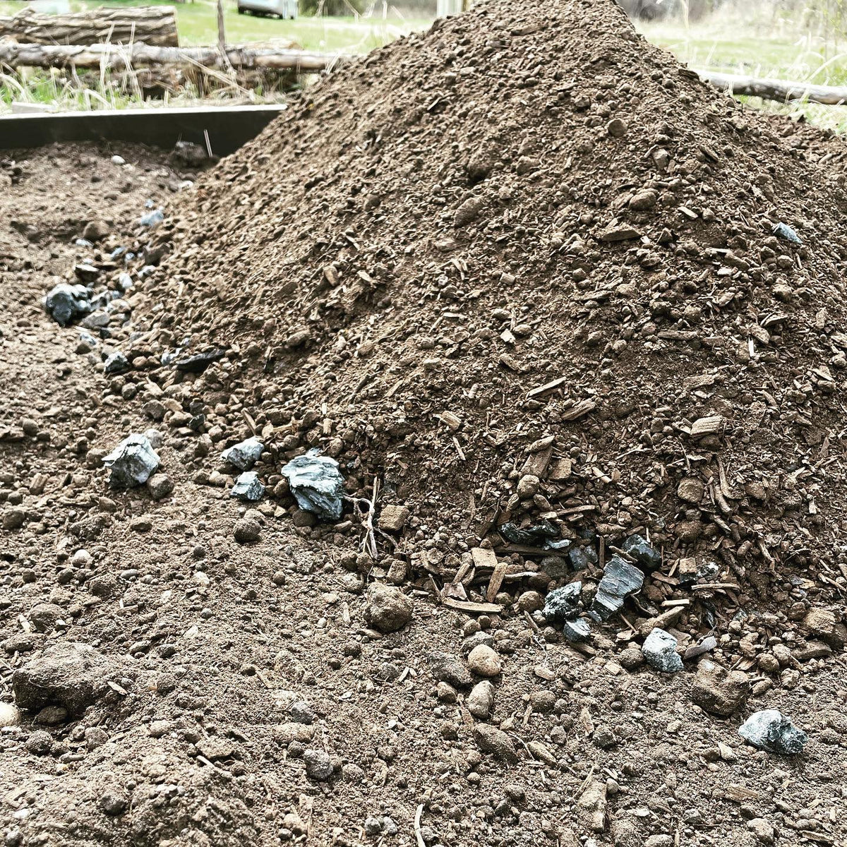 filling a new nursery bed with #compost and #biochar