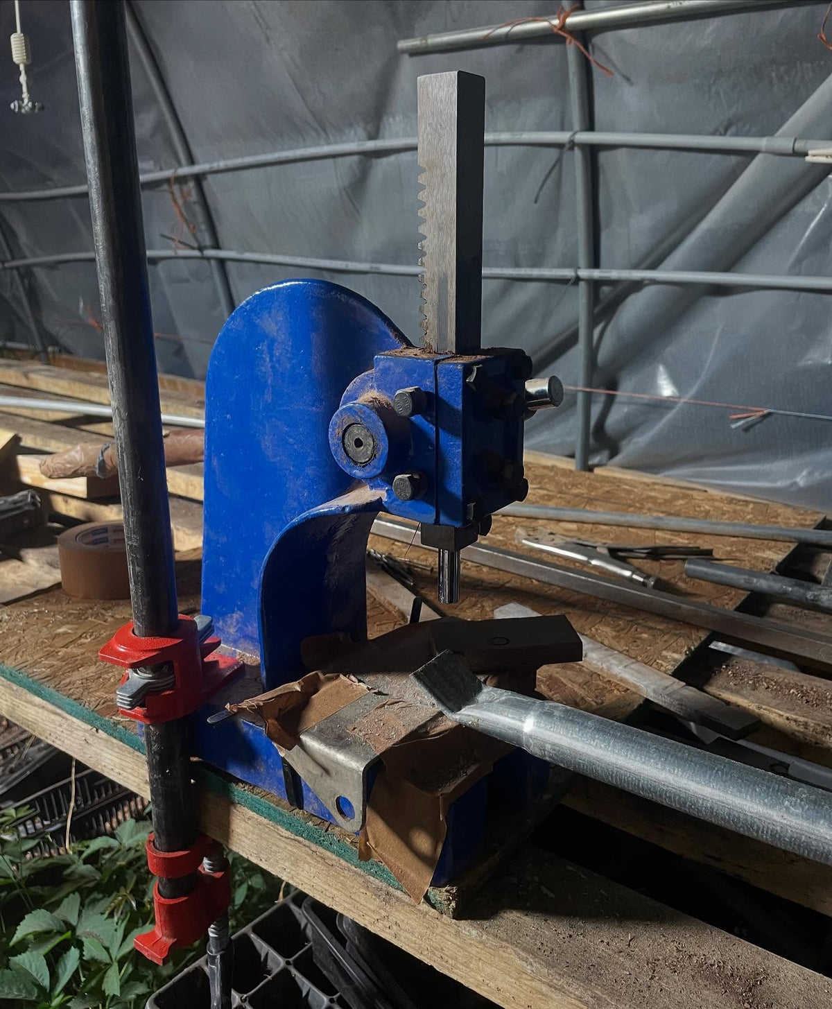 making greenhouse frame supports like this, by using a small press to crimp the pole ends, image 3 of 4