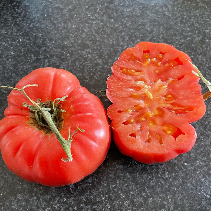Pink accordion #heirloom #tomato these are a nice surprise, they’re kind of meaty inside which is great for a toasted
